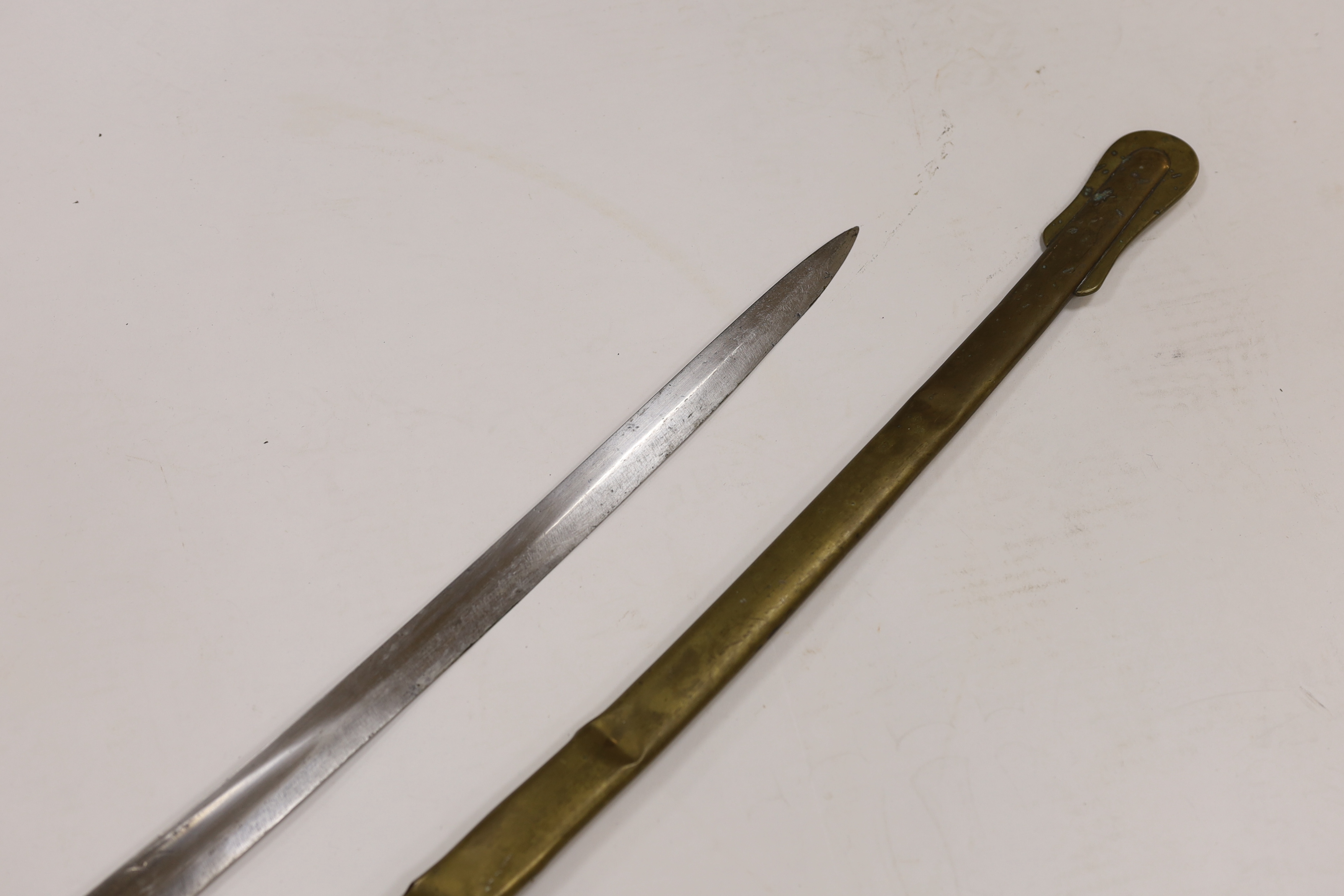 A scarce 1845 pattern infantry officer’s sword to the Penang Police, with regulation hilt, incomplete in its brass scabbard, blade 82cm